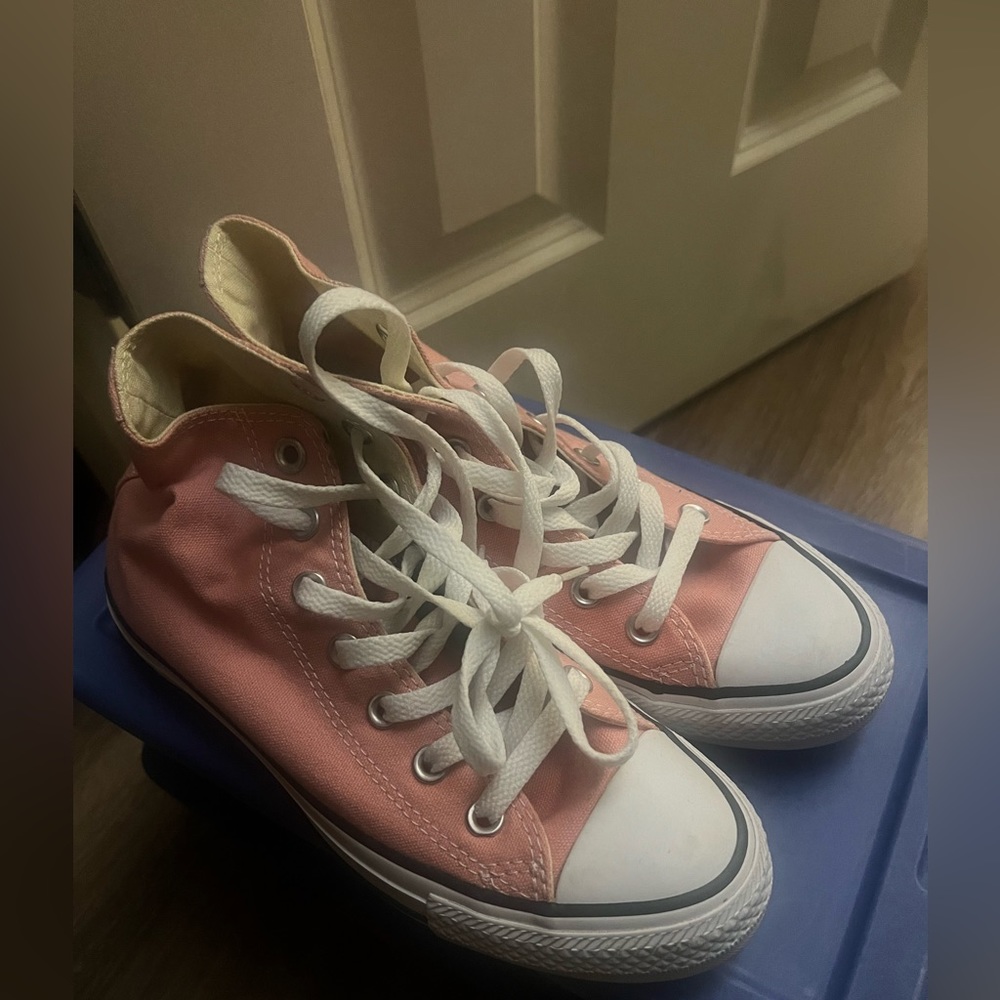 High top and low top converses pink and green